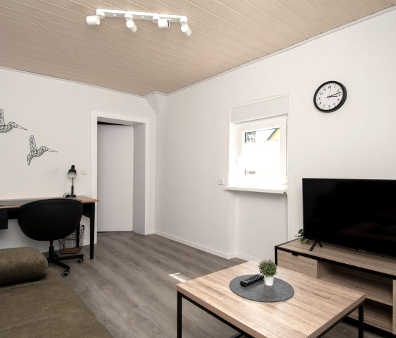 Wohnzimmer 1.OG und Arbeitsbereich Wohnzimmer 1.OG und Arbeitsbereich