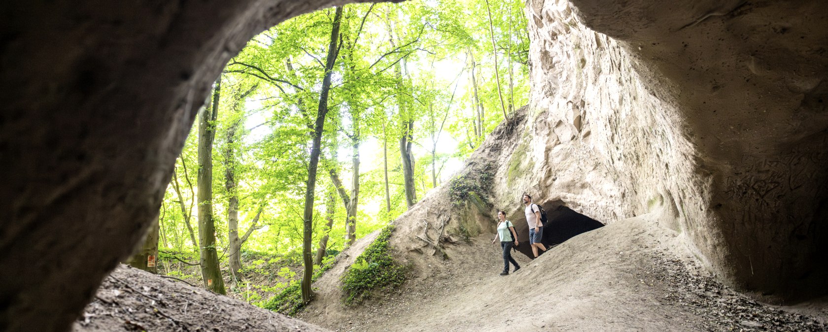 Hikers explore the Trass Caves near Burgbrohl, &copy; Eifel Tourismus GmbH, Dominik Ketz