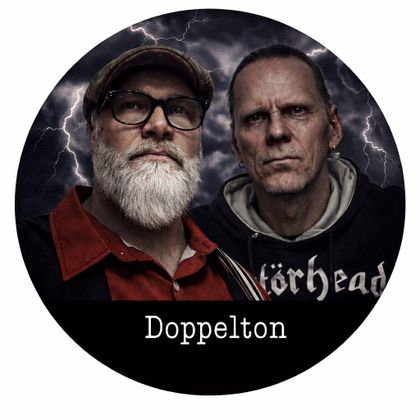 Two men are standing in a round frame against a stormy background. One is wearing glasses and a beard, while the other is wearing a black T-shirt.