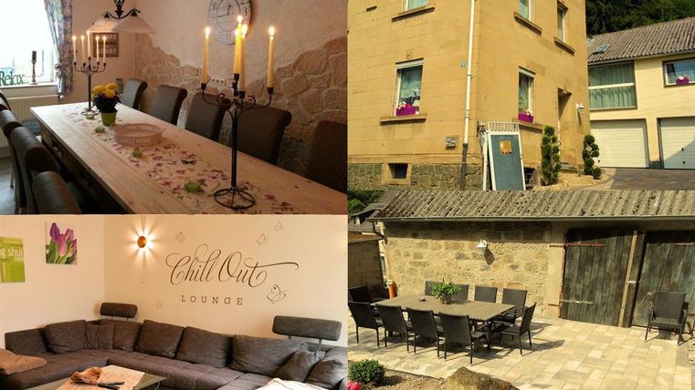 Eine stilvolle Wohnung mit einem Essbereich, einer gemütlichen Lounge und einem schönen Außenbereich. Die Umgebung ist grün und bietet eine entspannende Atmosphäre.