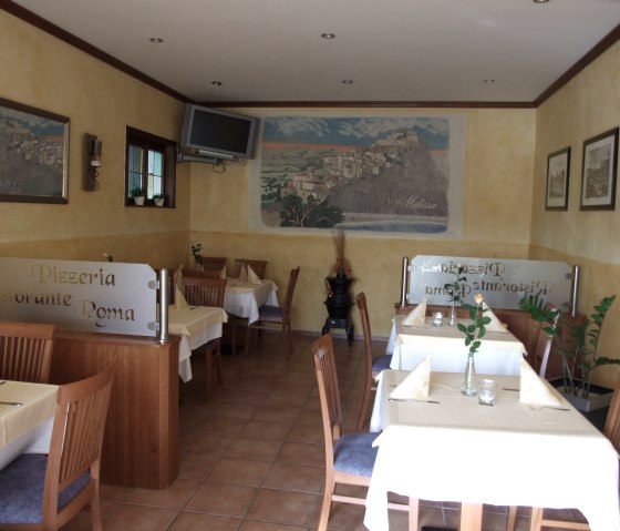 Pizzeria Roma Kruft - Tafels binnen, © VG Pellenz/Manea